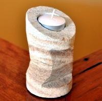 Carved sandstone candle holder